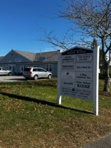 Directory sign outside the Cunningham Security Systems Cape Cod office in Pocasset, Massachusetts